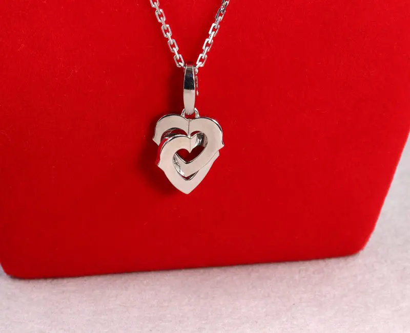 Pendentif double coeur Cartier